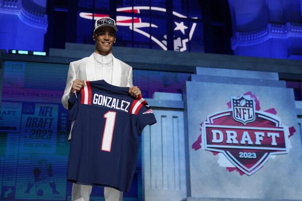 Patriots trade back select CB Christian Gonzalez at No. 17 AP News